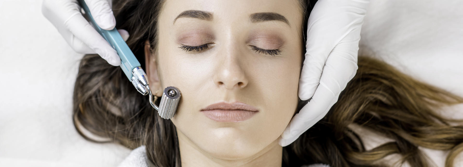 face of a beautiful woman during a cosmetic procedure