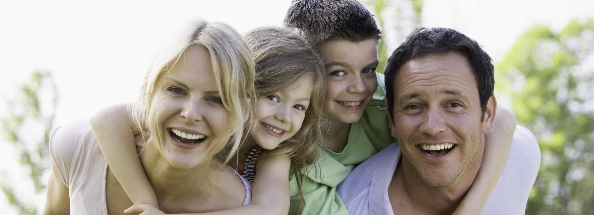 smiling family with children