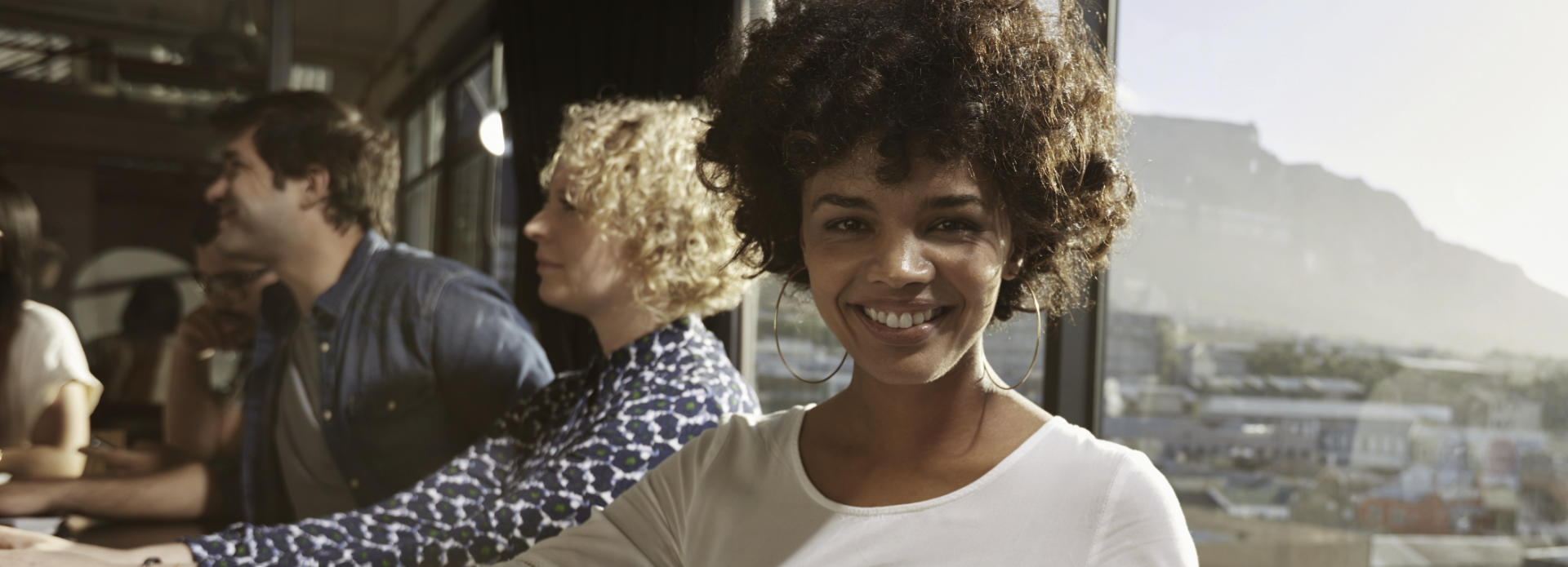 beautiful smiling woman with curly hair