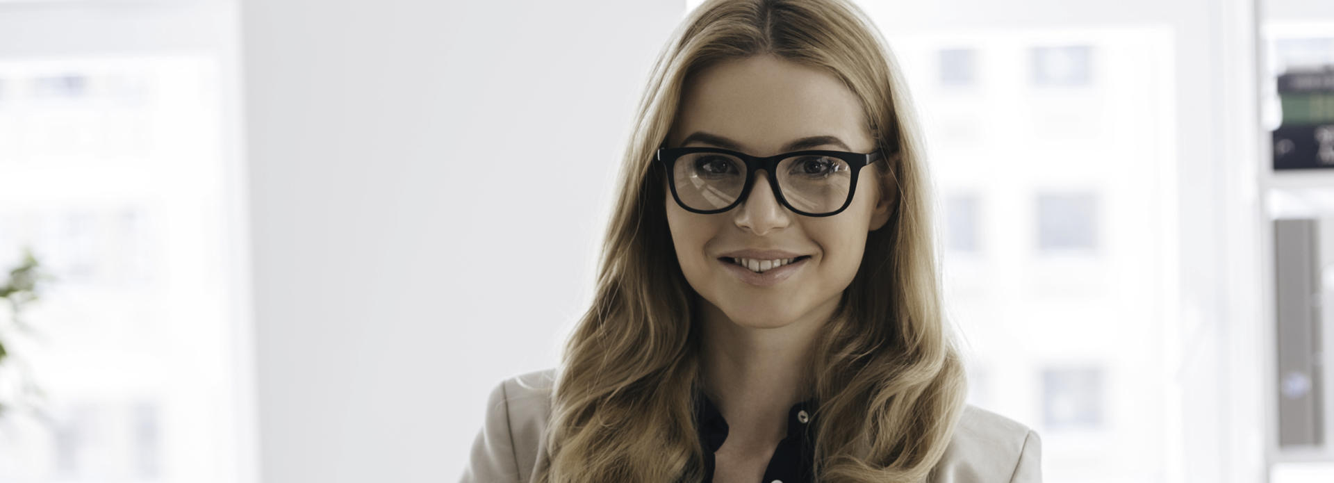 smiling woman in glasses