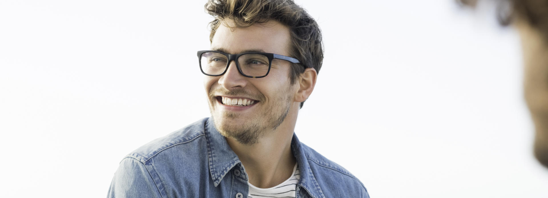 cheerful man in glasses