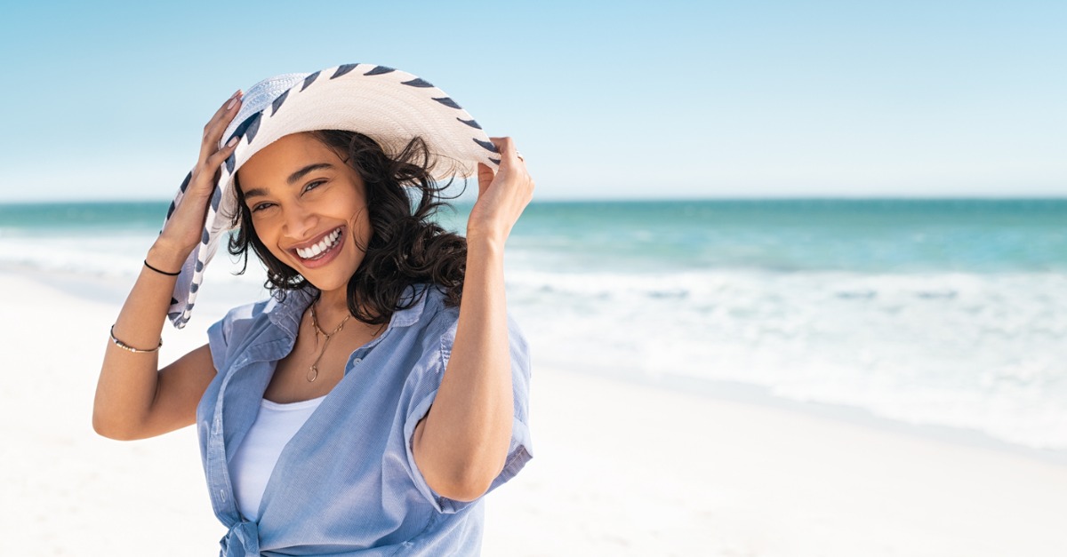 Smiling woman at the beach