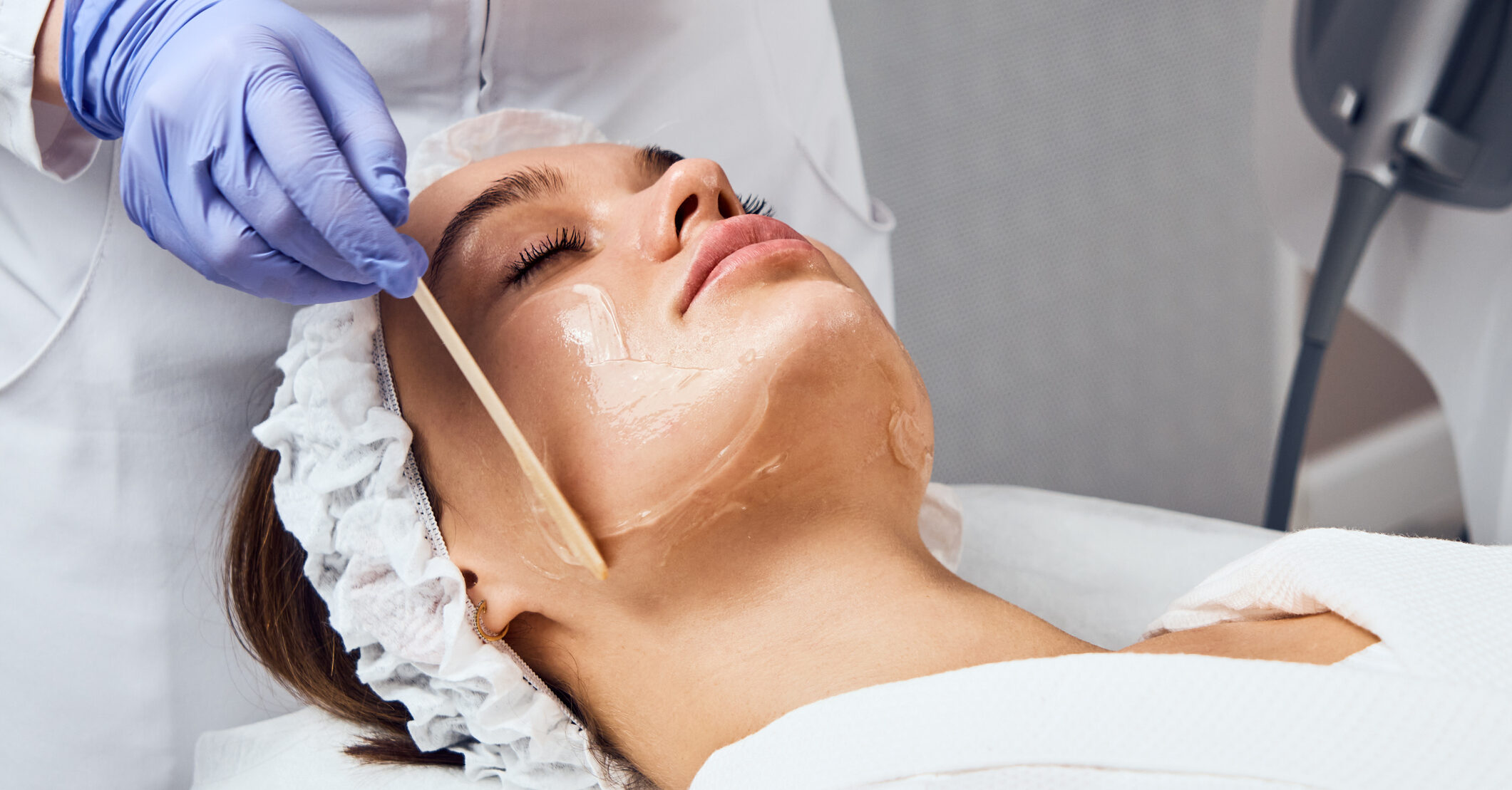 Close-up Of Woman Getting Facial